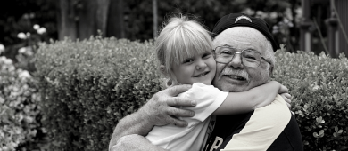 Give Where you Live - child hugging grandfather