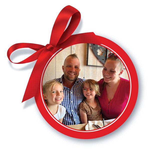 Marc Gibbons family in circular gift tag with bow