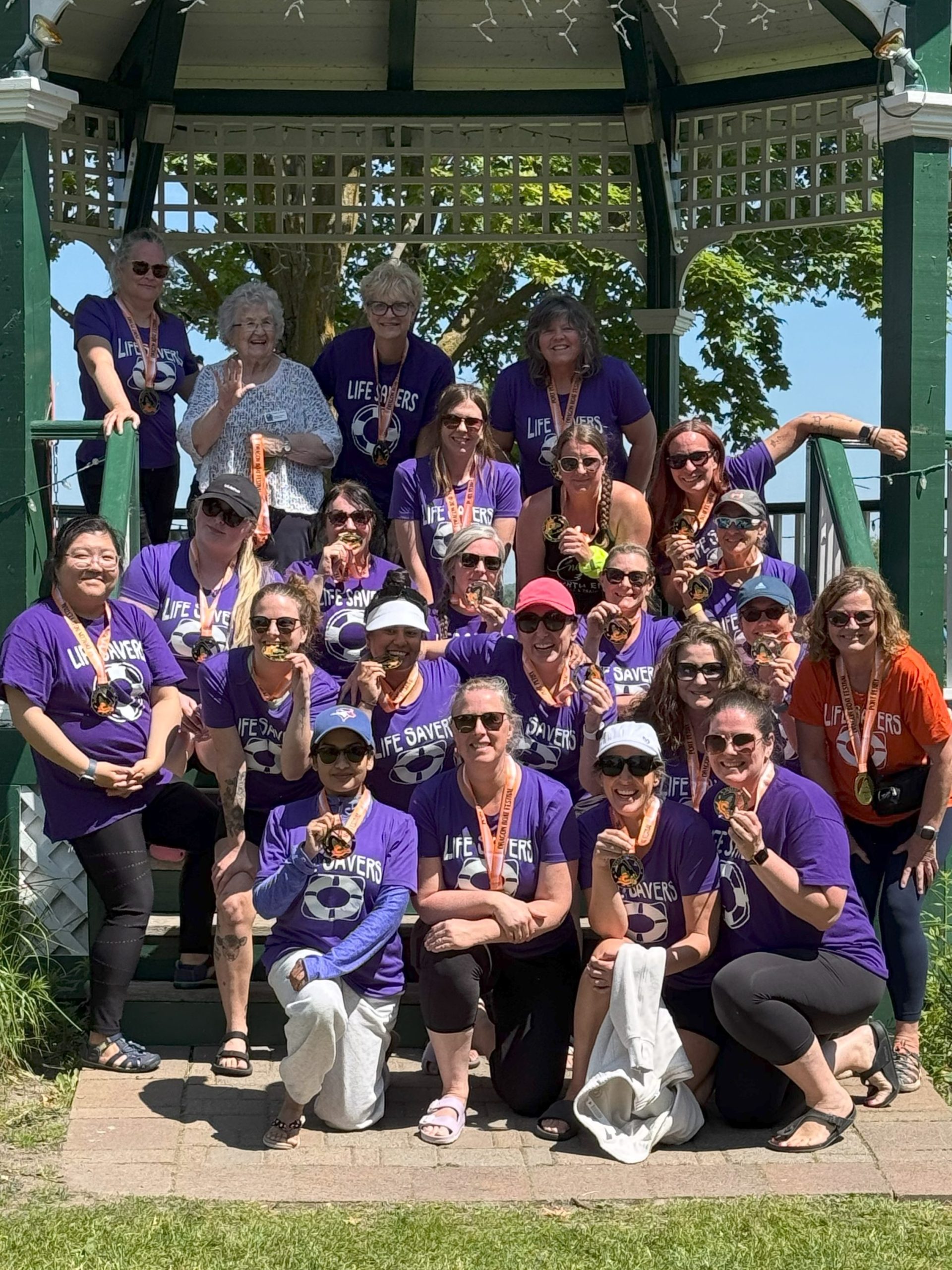 Life Savers team group photo by the gazebo.